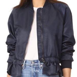 Frame Nylon bomber with ruffle at bottom. Like new